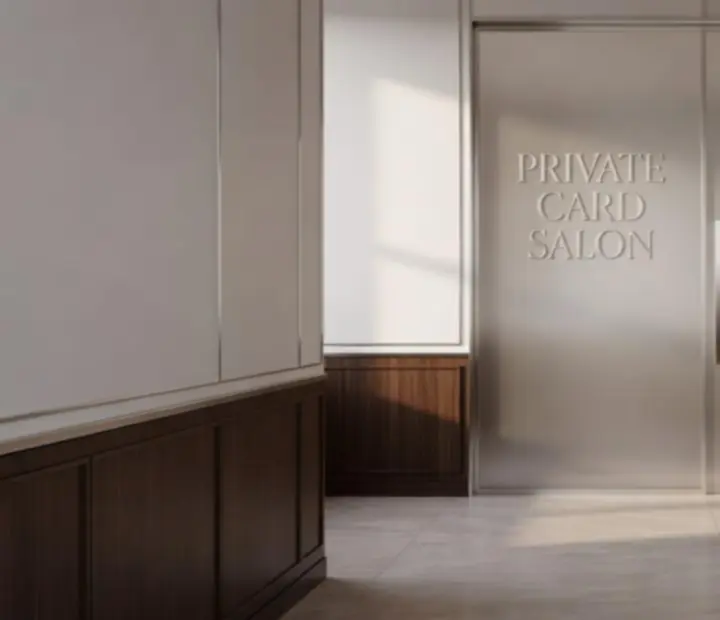 Entrance to The Showdown Salon with a discreet doorway leading to a refined card lounge.